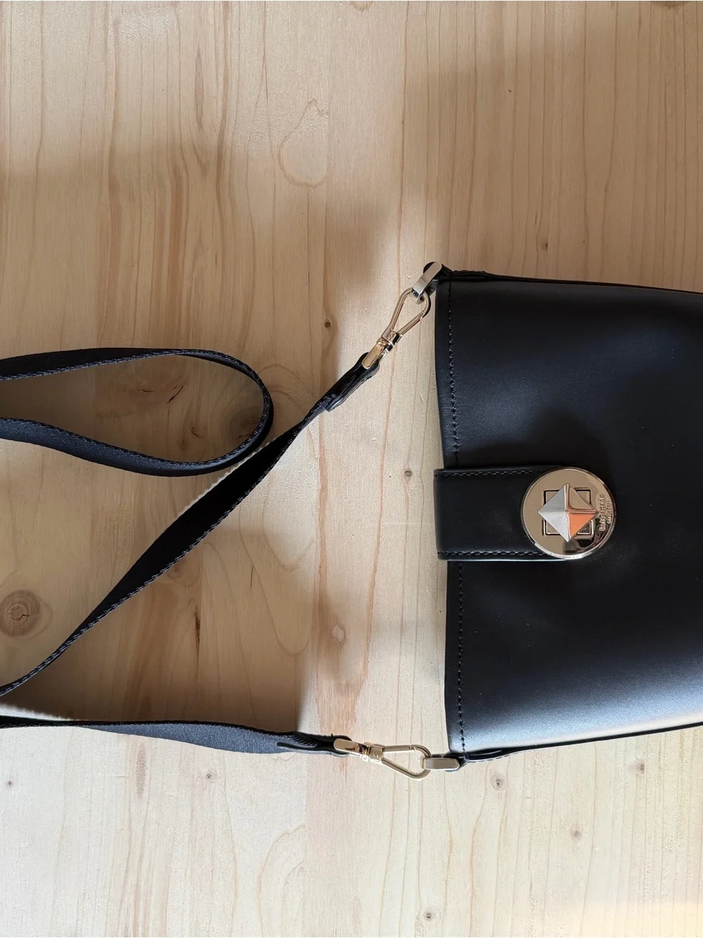 kate spade Black Leather Bucket Crossbody with Gold Medallion
